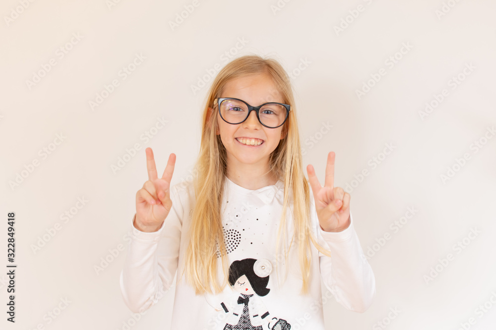 Blonde girl with glasses making gesture Blonde girl with glasses making gesture