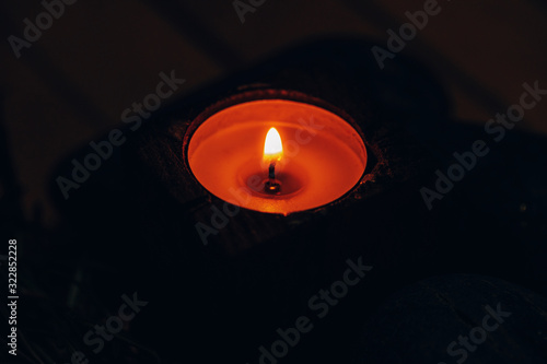 Dark candle. Candle. SPa. Cocnept.  © Erika