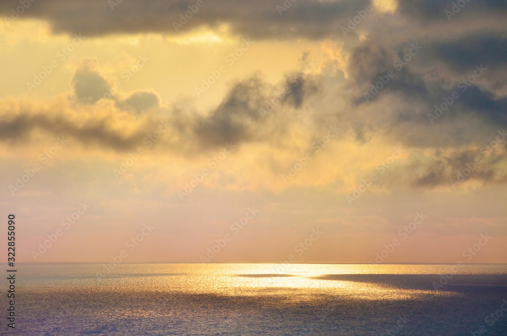 Obraz premium Beautiful Golden Sunset over the Sea .Sea Landscape with Clouds