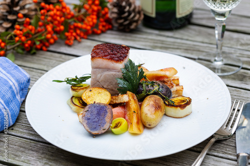 Meat with grilled potatoes and vegetables