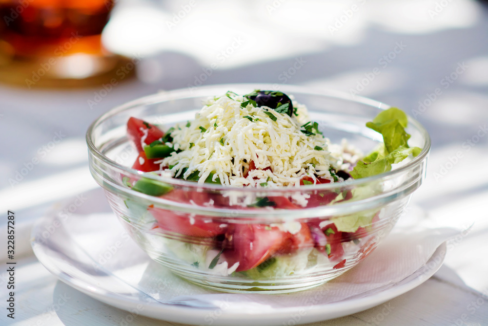 Traditional Bulgarian Salad Called Shopska with Tomato,Cucumber and Cheese Traditional Bulgarian Salad Called Shopska with Tomato,Cucumber and Cheese