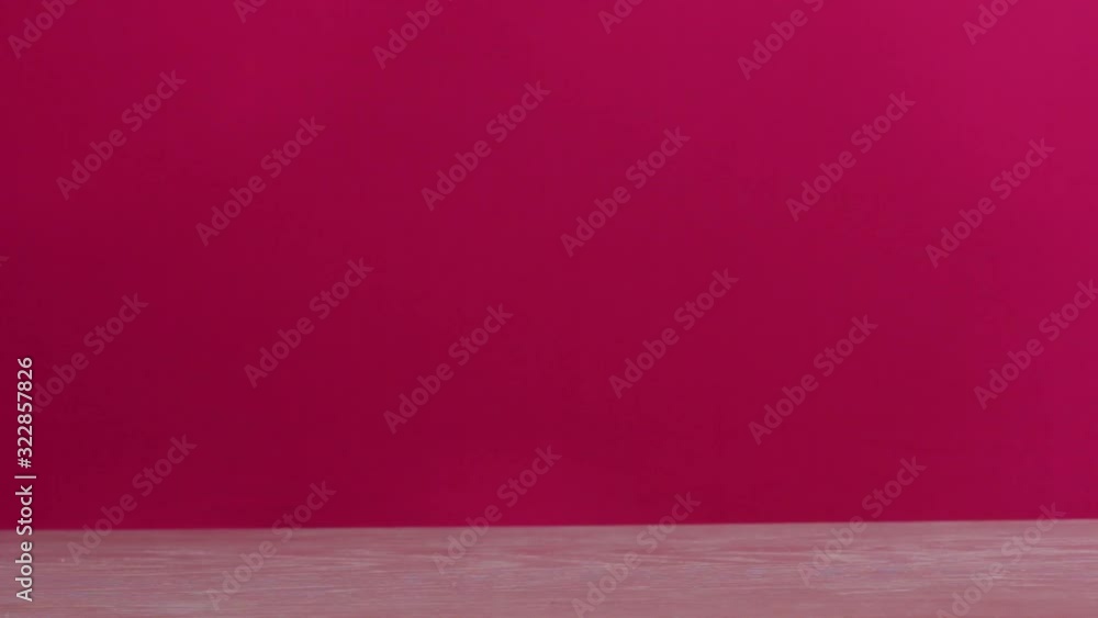 Man hand placing bouquet on a table Man hand placing bouquet on a table