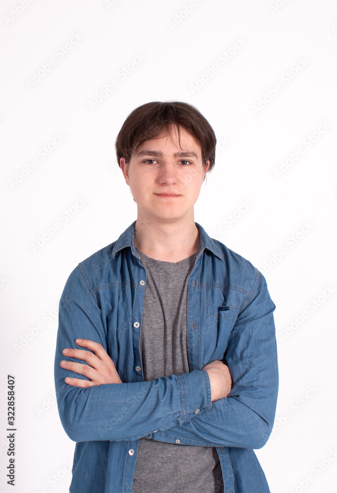 Happy smiling young man looking at camera with joy and confidence, isolated on white background. Happy smiling young man looking at camera with joy and confidence, isolated on white background.