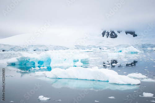 Broken melting pieces of ice at Antarctic peninsula, stunning icy scenery landscape in Antarctica