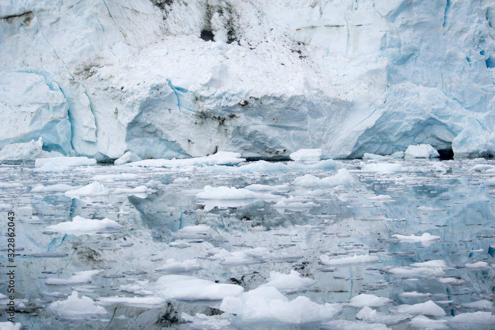 Broken melting pieces of ice at Antarctic peninsula, stunning icy scenery landscape in Antarctica Broken melting pieces of ice at Antarctic peninsula, stunning icy scenery landscape in Antarctica