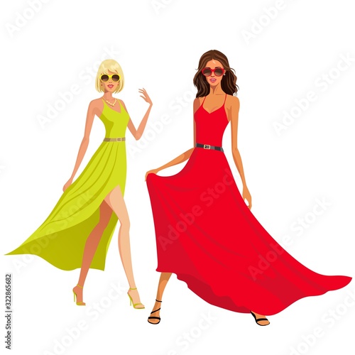 two attractive models are walking on the catwalk