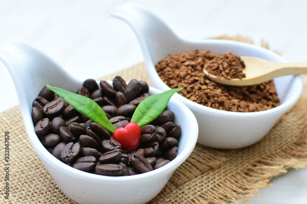 Coffee beans, accompanied by processed coffee powder Coffee beans, accompanied by processed coffee powder