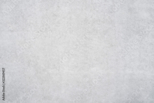 Texture of a smooth gray concrete wall as a background