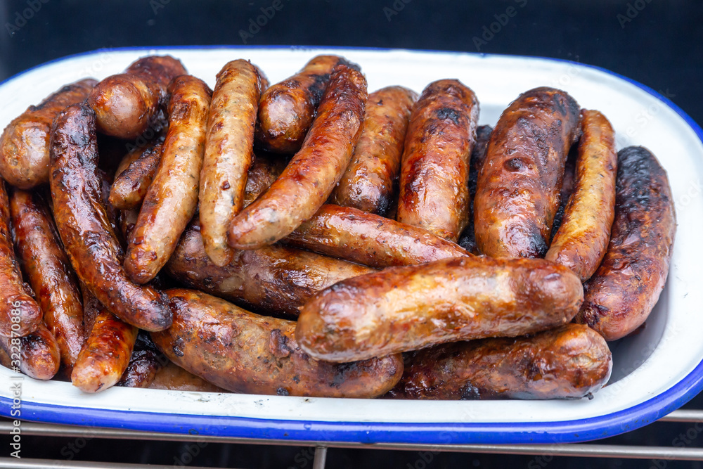Pile of a variety of freshly cooked barbecue sausages Pile of a variety of freshly cooked barbecue sausages