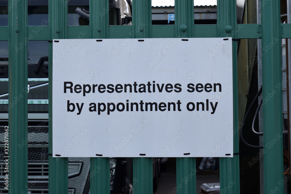 White Plastic Sign on Steel Fence 'Representatives Seen By Appointment Only' White Plastic Sign on Steel Fence 'Representatives Seen By Appointment Only'