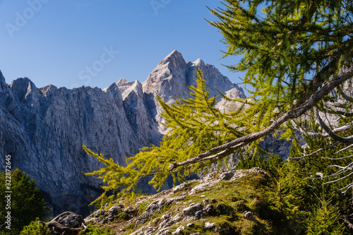 Beautiful view towards Jalovec mountain on Slemenova spica plateau in Slovenia photo