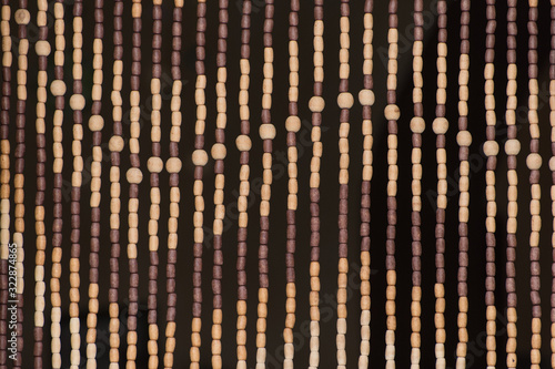 Wooden curtains. Beads background. Backdrop, copy space