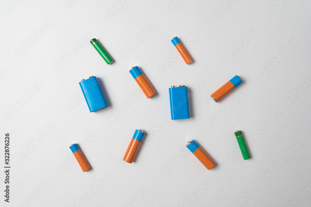 AA, AAA and PP3 batteries on white background. AA, AAA and PP3 batteries on white background.
