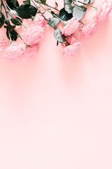 Beautiful flowers composition. Pink  rose flowers on pastel pink background. Valentines Day, Easter, Birthday, Happy Women's Day, Mother's day. March 8. Flat lay, top view, copy space