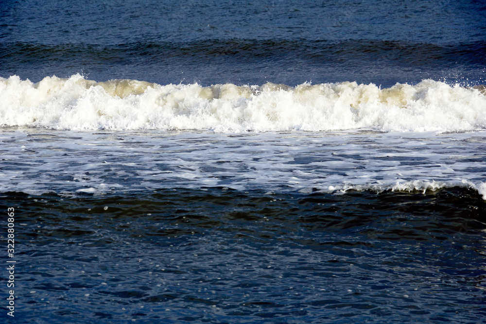 Shoreline of Tybee Island with waves Shoreline of Tybee Island with waves