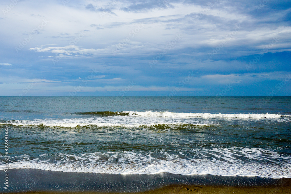 Shoreline of Tybee Island with waves Shoreline of Tybee Island with waves