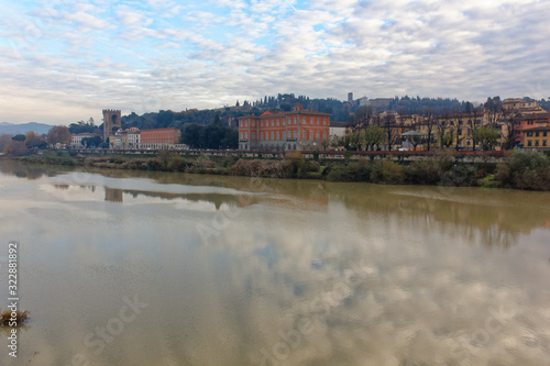 Florence firenze italy from one of the shores of arno river during sunset in winter 