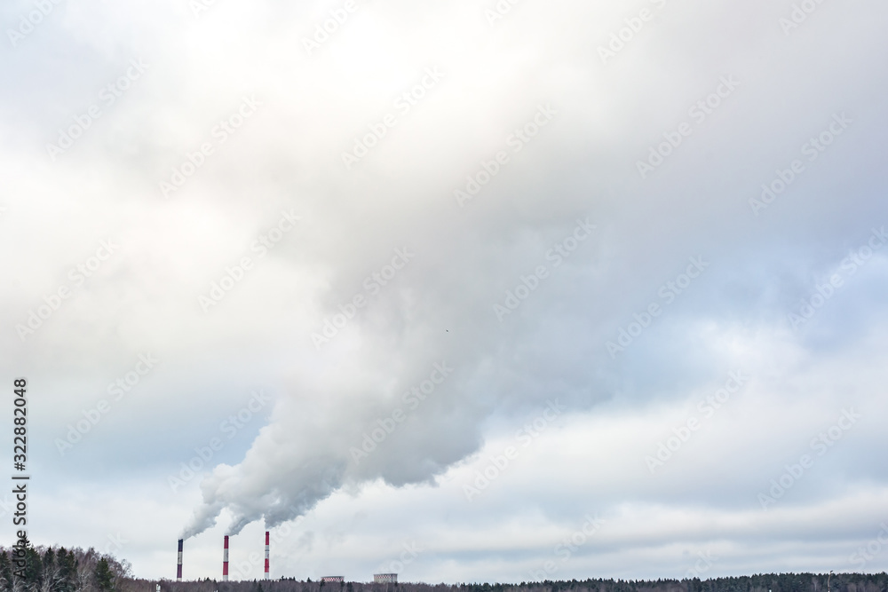 pipes of a chemical enterprise plant. Air pollution concept. Industrial landscape environmental pollution waste of thermal power plant pipes of a chemical enterprise plant. Air pollution concept. Industrial landscape environmental pollution waste of thermal power plant