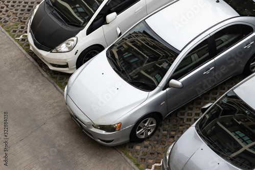 Top view of silver car parking inline outdoor. © JC_STOCKER