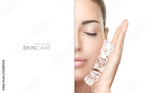 Spa Woman with healthy clean skin applies ice cubes on face. Cold Beauty Treatments photo