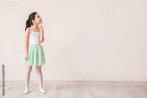Wallpaper Mural Little ballerina near white wall Torontodigital.ca