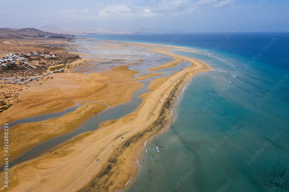 This is an aerial drone shot from Canary islands. Sotavento beach is on the coast of Fuerteventura island. October 2019 This is an aerial drone shot from Canary islands. Sotavento beach is on the coast of Fuerteventura island. October 2019