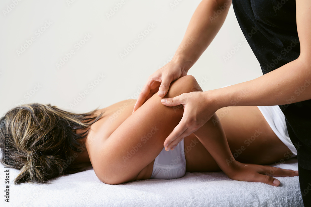 Obraz premium Fat burning anti cellulite massage for young woman in wellness center. Perfect skin fat burning weight loss beauty concept