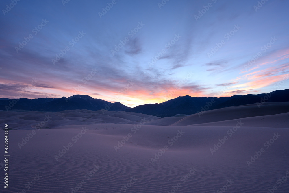 Obraz premium Morning Light Erupts Behind Mountains