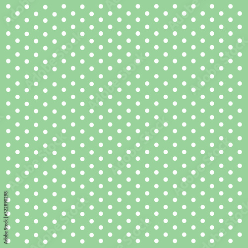 Polka dot on green background. 