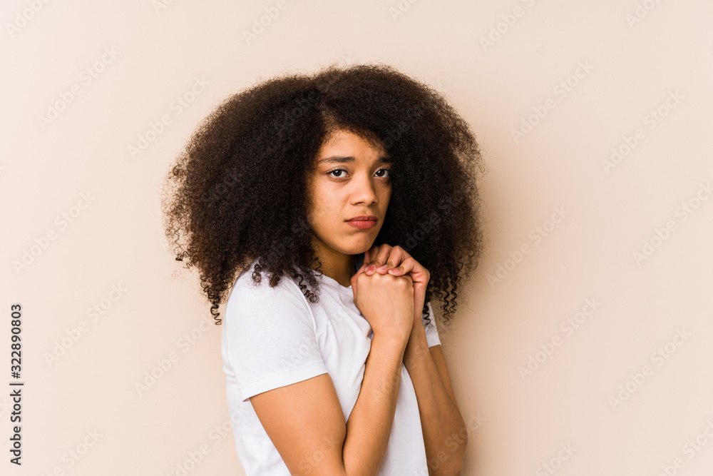 Young african american woman scared and afraid. Young african american woman scared and afraid.