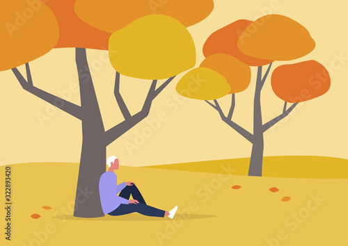 Young male character sitting under the tree, autumn outdoor leisure, hiking