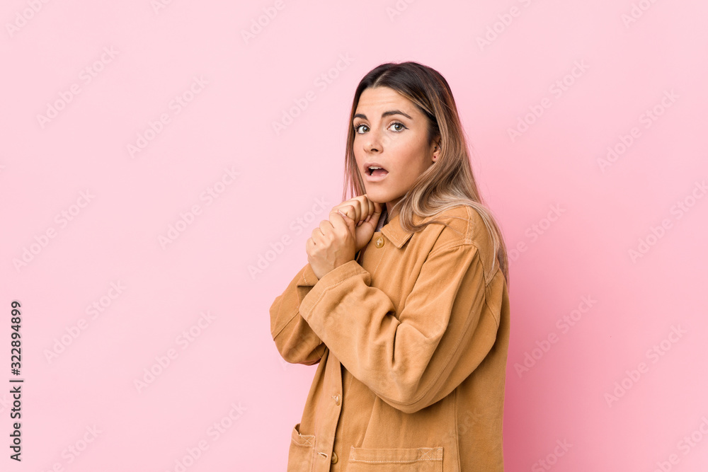 Young caucasian woman isolated scared and afraid. Young caucasian woman isolated scared and afraid.