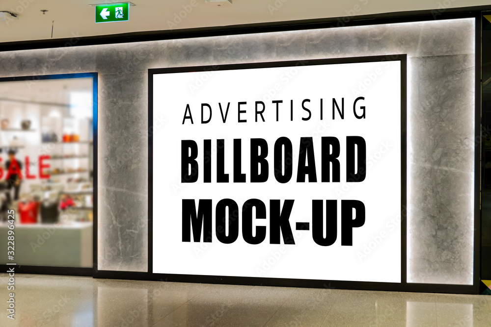 Mock up Large blank advertising billboard on wall of shop Mock up Large blank advertising billboard on wall of shop