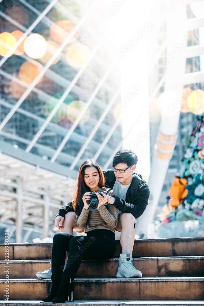 Happy Asian tourist couple in love on vacation concept.