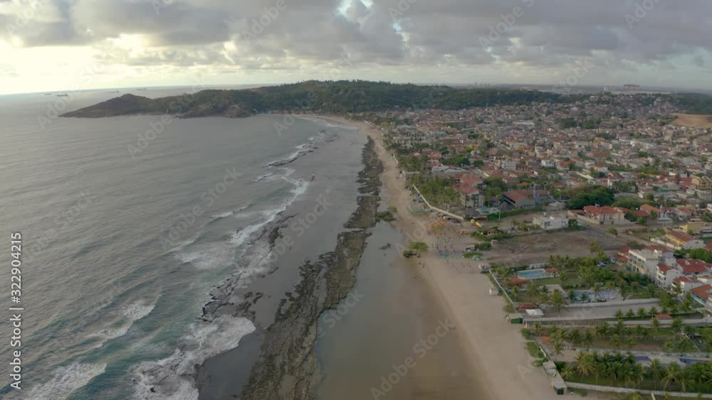 Aerial shot of Enseada dos Corail beach with mountais on background Aerial shot of Enseada dos Corail beach with mountais on background
