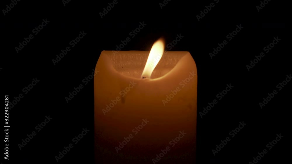 Candle burning in the dark and being blown off in the end. Candle burning in the dark and being blown off in the end.