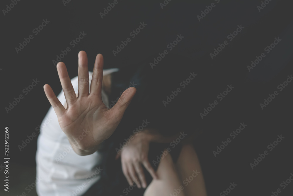 Fototapeta premium Stop violence against women.woman showing her denial with on her hand