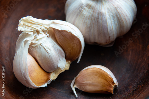 Peeled Garlic close-up shot on vintage background