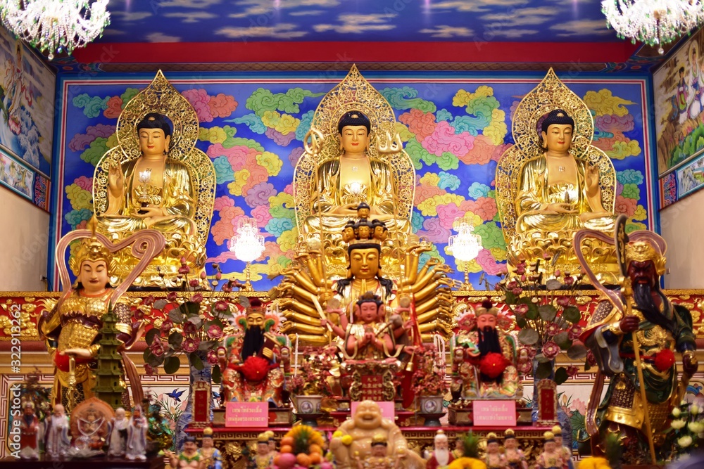 Fototapeta premium Golden statue of buddha in temple, Thailand 