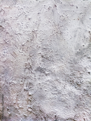 White coarse cement mortar surface for use in design and graphic work © Takorn