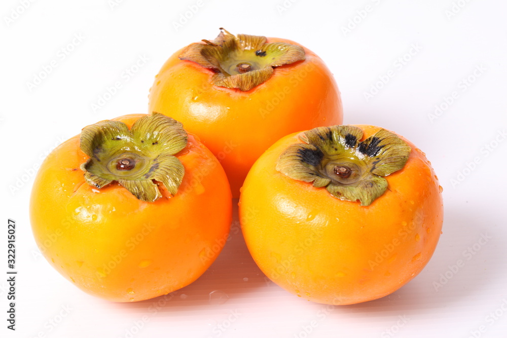 Persimmon fruit isolated on white background Persimmon fruit isolated on white background