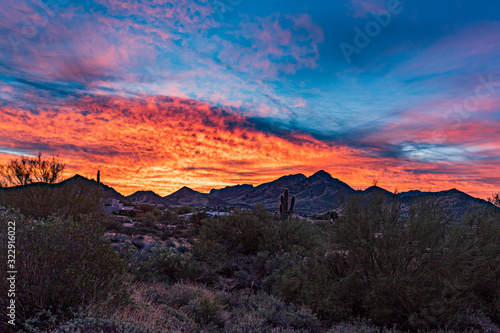 Sunrise over the desert mountains