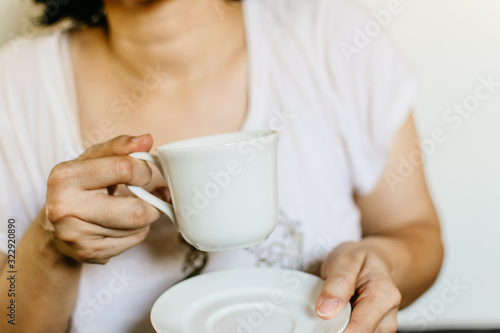 woman with cup of coffee