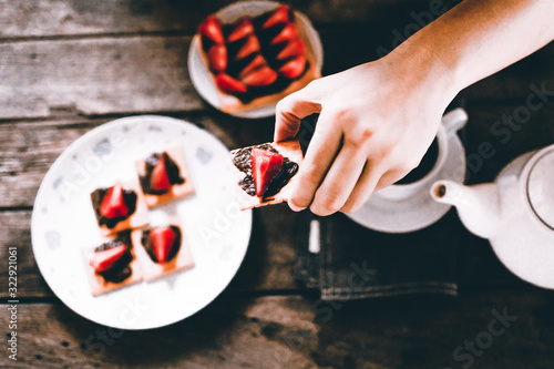 Breakfast sets were placed on a wooden table.