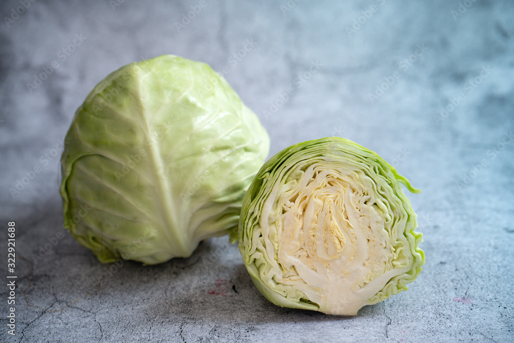 Fototapeta premium Chinese cabbage, white cabbage, cabbages and cut cabbage on mable stone.