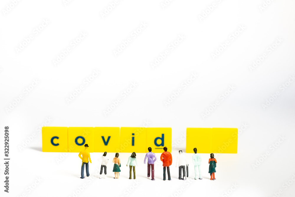 Covid-19 Coronavirus Concept - Miniature figurienes, still object on white background, shallow depth of field.