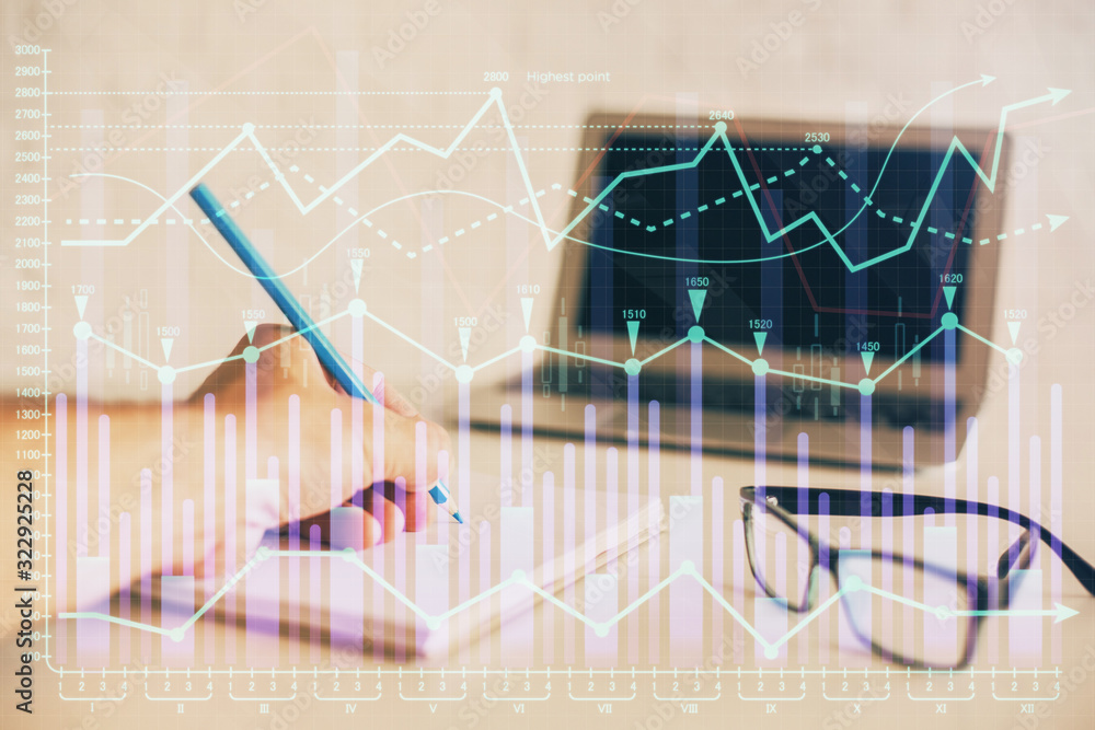 Multi exposure of man hands with stock market forex graph. Multi exposure of man hands with stock market forex graph.