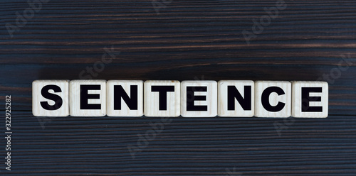 concept word sentence on cubes on a beautiful dark wooden background