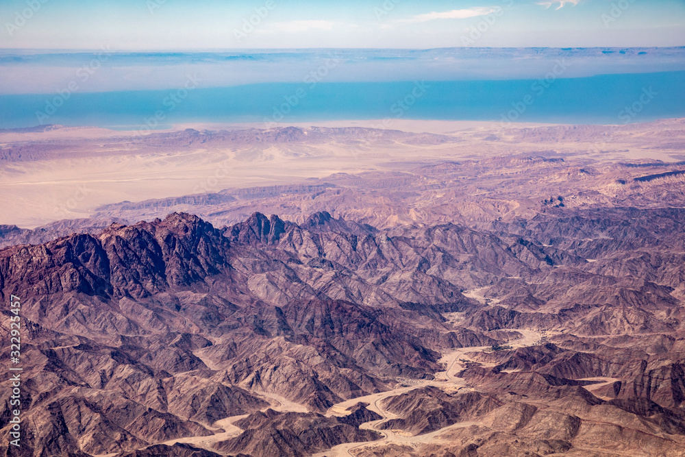 Aerial view of mountains in the Sinai through an airplane window
