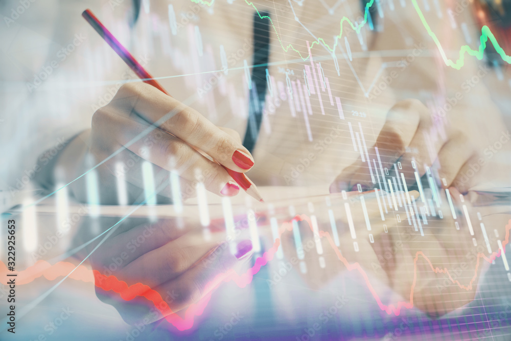 custom made wallpaper toronto digitalA woman hands writing information about stock market in notepad. Forex chart holograms in front. Concept of research.